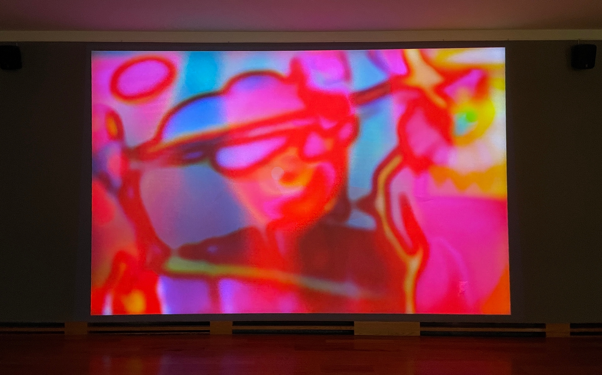 View of the main projection showing a collage of overlayed videos